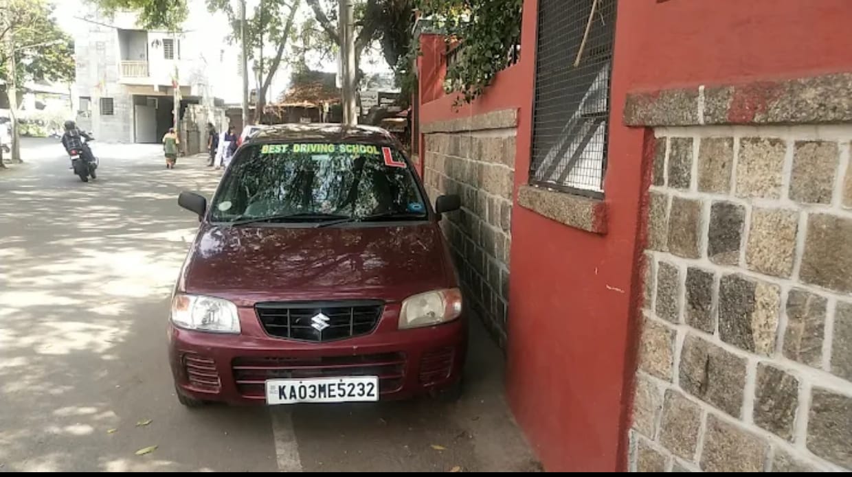 Certified driving instructor helping a student